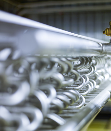 Inzoomad bild på metalldetaljer i en tork.