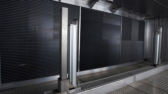 Interiör av Valutecs virkestork med värmeväxlare för värmeåtervinning.